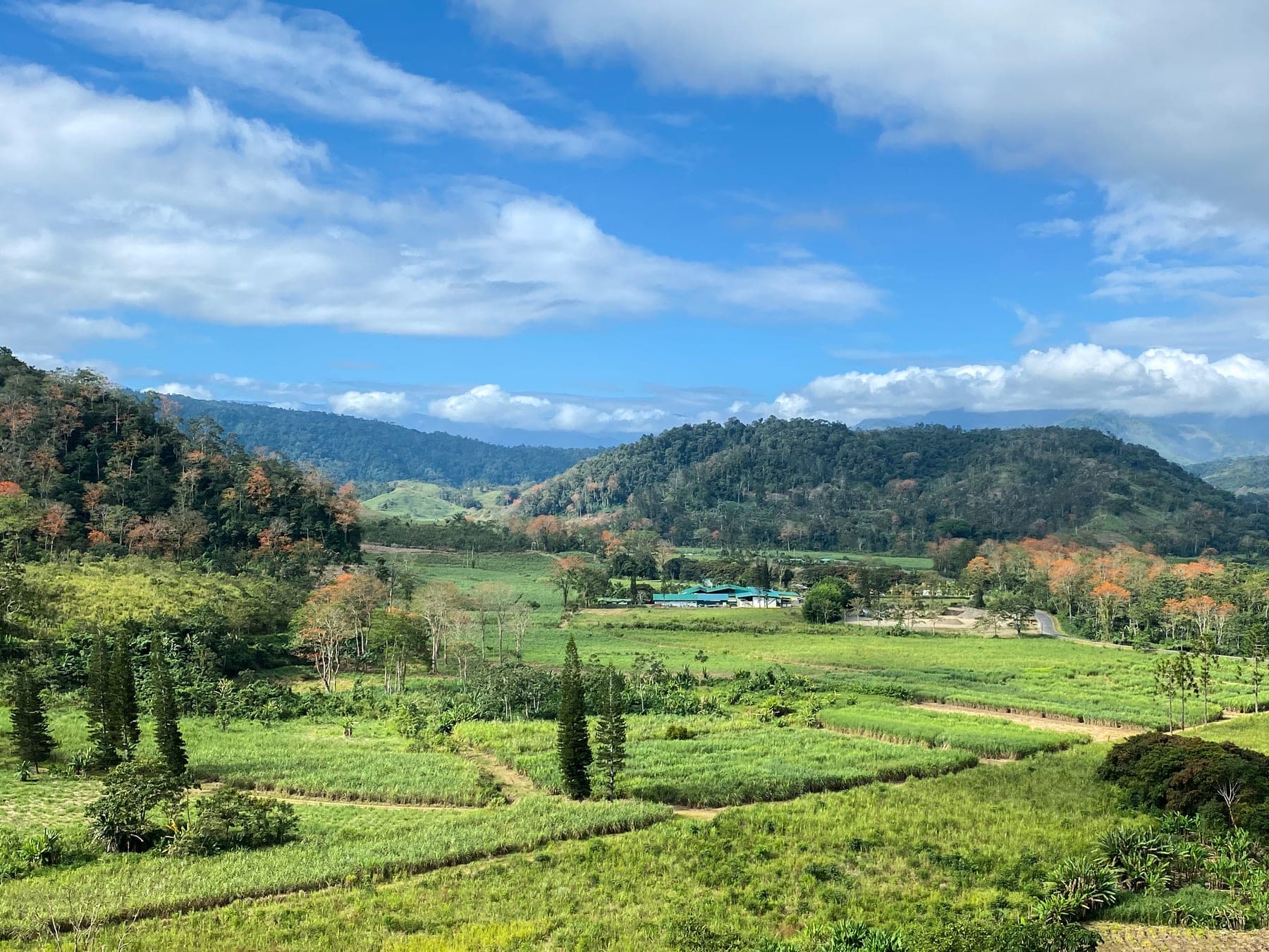 Layered green ridges of the Cordillera de Talamanca under a cloudy sky